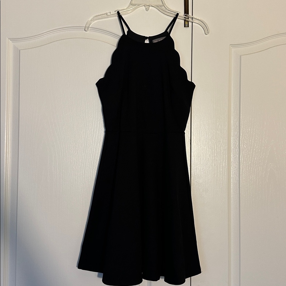 Versatile Little Black Dress. Scalloped halter neckline. Size S. Rags To Wishes
